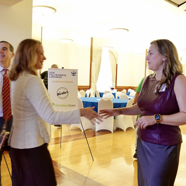 Dr. Niki Serravalle greeting a guest at the Middletown Area Chamber of Commerce Fall Business Luncheon