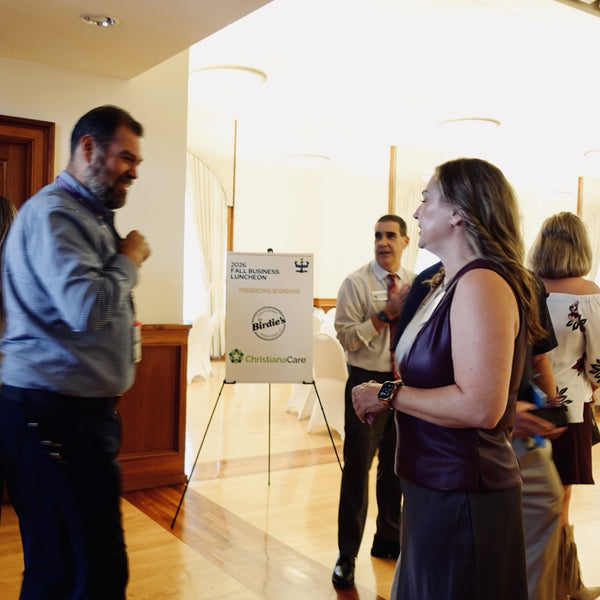 Dr. Niki Serravalle in conversation at the Fall Business Luncheon