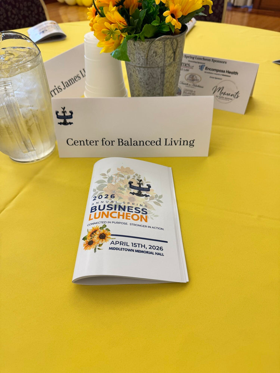 Center for Balanced Living table card and program at the MACC Spring Business Luncheon