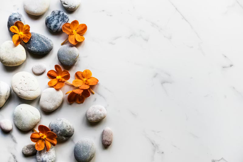 Smooth stones and flowers